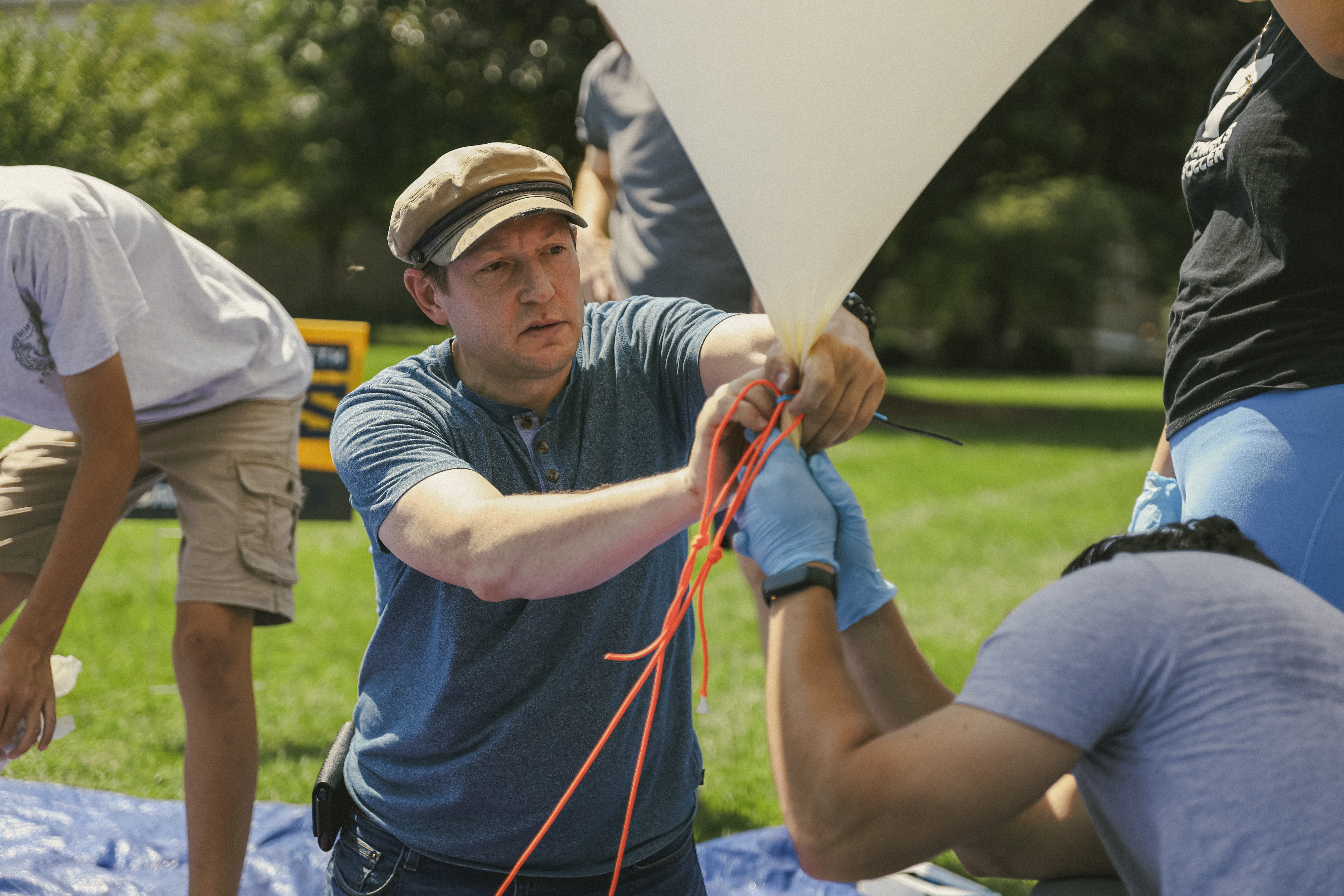 A balloon is prepared to launch at Trevecca's campus.