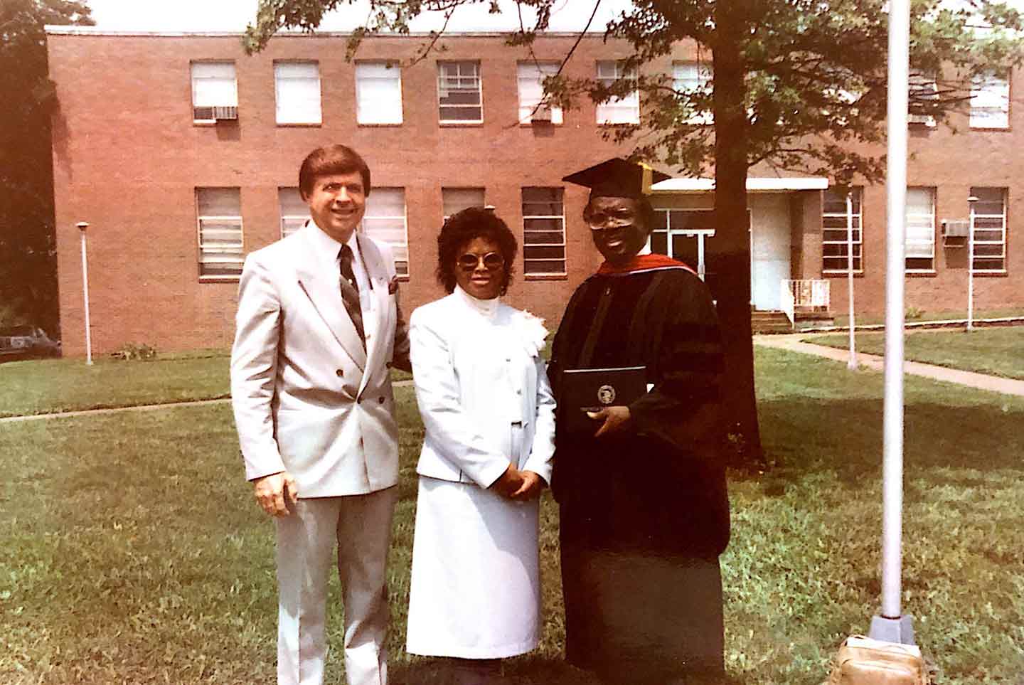 Charles Johnson poses with his new doctorate degree.