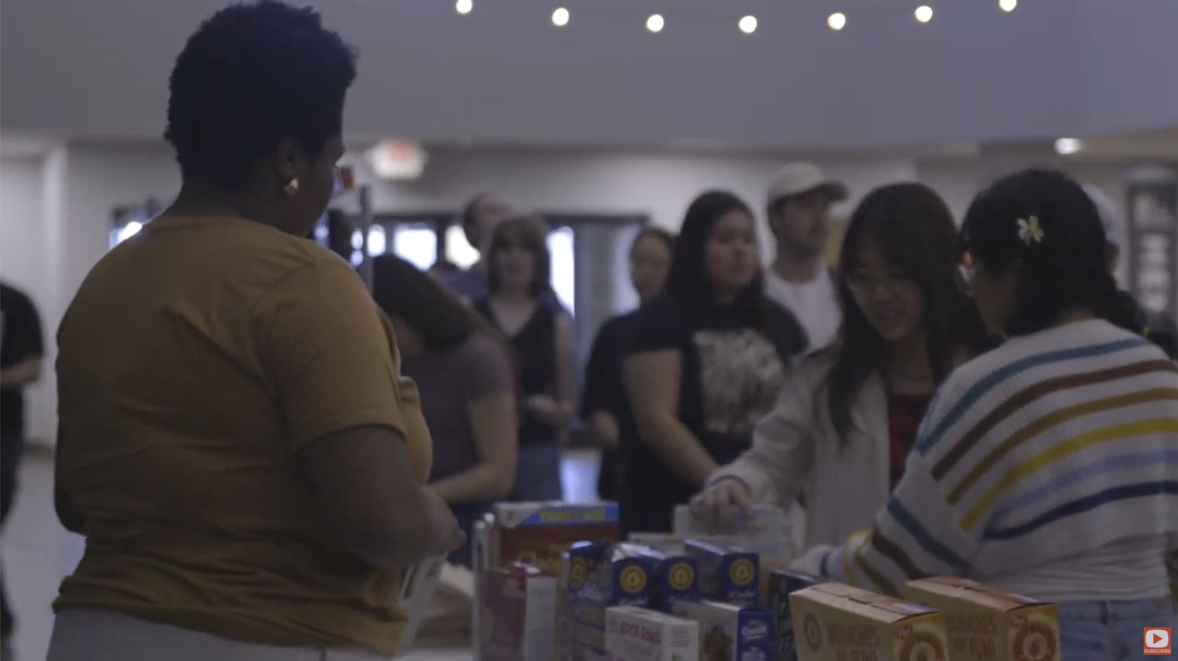 Trevecca students selecting food from the Rebecca's House pantry